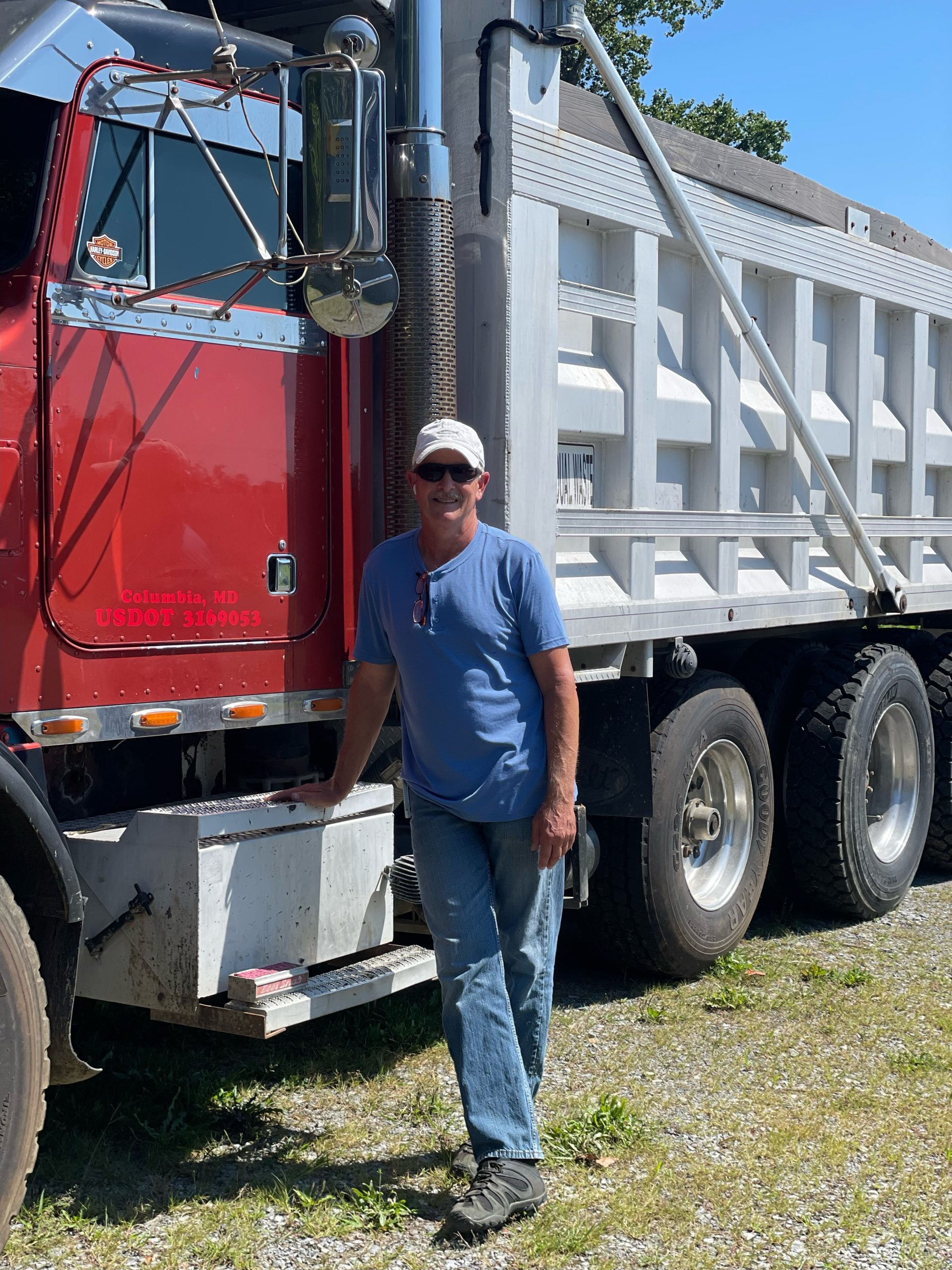 Tom By Red Peterbilt with cap